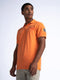 POLOSHIRT MIT AUFDRUCK MEANDER-Petrol